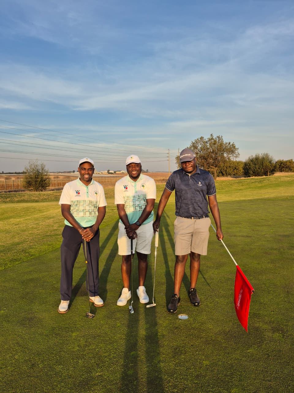 Steve Warobi Gitao from Kenya, Kuda Kennedy Machiwana and Patrick Makamure on the last hole, Golf day at AGTC 2026